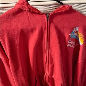 Red Zip-Up Hoodie with Tropical Graphic